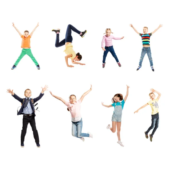 Set of images of jumping children of different age. Isolated over white background. Royalty Free Stock Photos