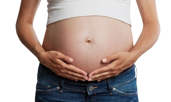 一个怀孕后期肚子大的女人摸了摸他的手 前面的景色被白色的背景隔离了母性 柔情和关怀 — 图库照片