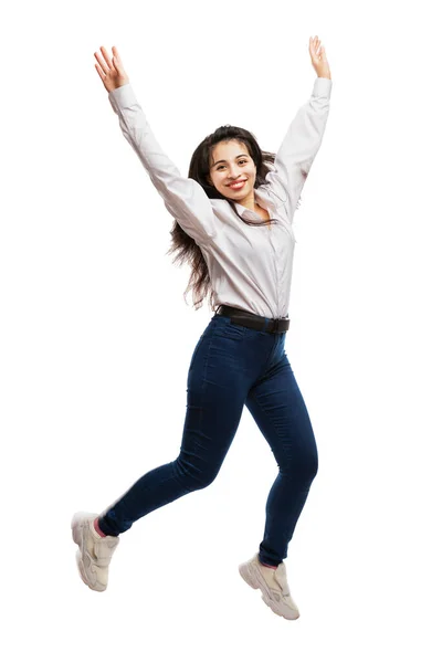 Uma Jovem Jeans Uma Camisa Branca Está Pulando Morena Sorridente — Fotografia de Stock