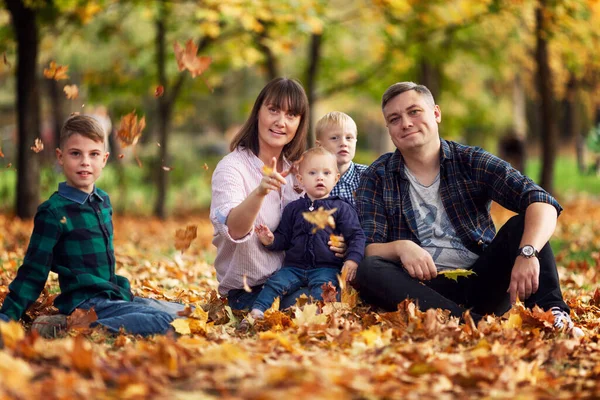 Family Three Children Sitting Autumn Park Fallen Yellow Leaves Love — Stock Photo, Image