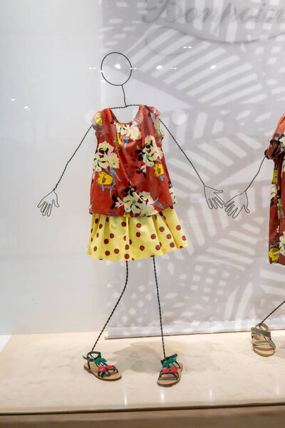 Club 21 Kids shop at Emquatier, Bangkok, Thailand, Jun 29, 2018 : Creative wire structure for luxury and fashionable kids clothing display in front of the shop.