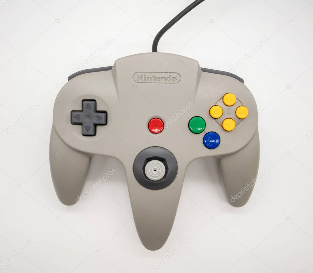 Nintendo64 : Bangkok, Thailand - July 12, 2018 : grey Nintendo 64 game controller isolated on white background.