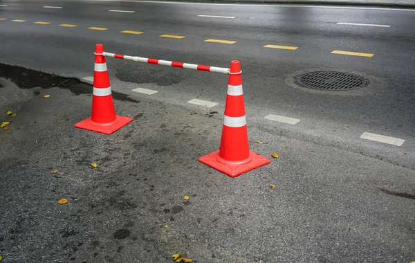 Two Orange Traffic Cones Concrete Road Standing Close Some Part — Stock Photo, Image