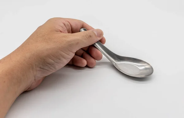 Cucchiaio corto in argento usato isolato su bianco — Foto Stock