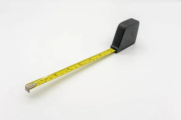The measuring tape is isolated from the white background. — Stock Photo, Image