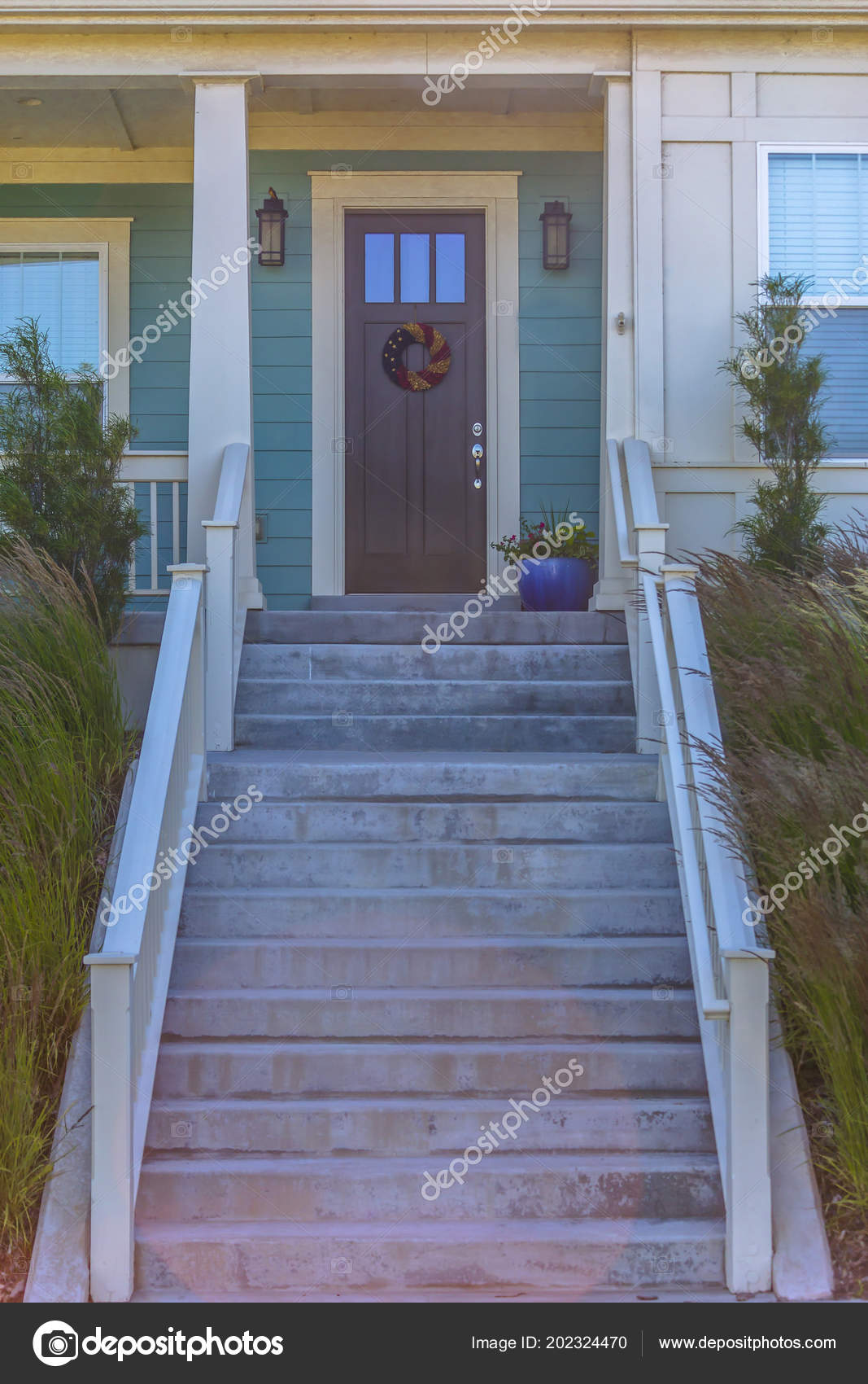 Front Door Entry Stairyway With Wreath Stock Photo