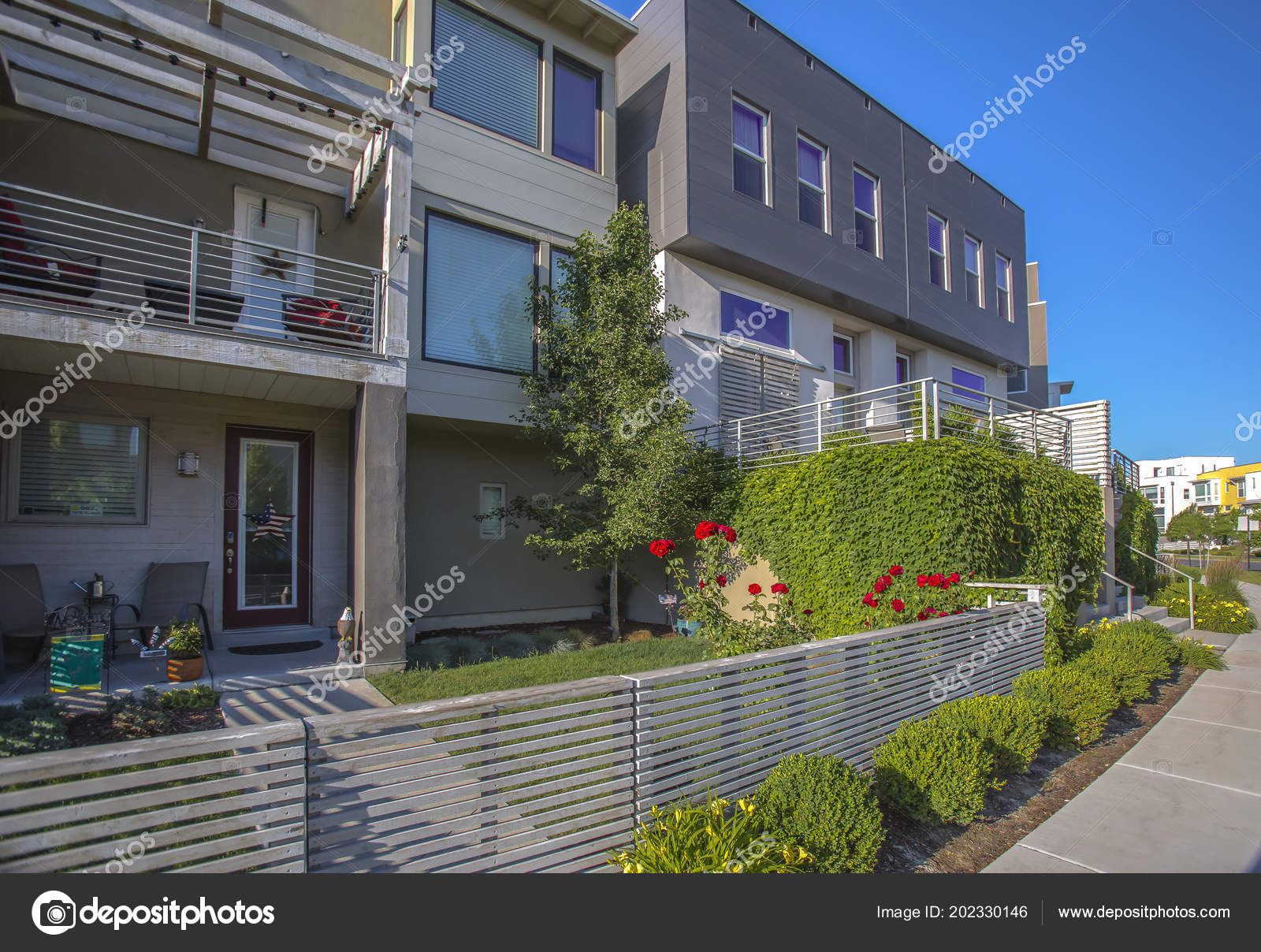 Rows Of Townhome Entry Ways In Suburbs Stock Photo