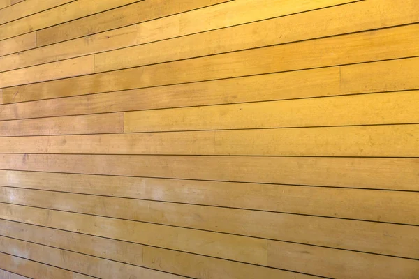 Accent wall of wood seen on the exterior