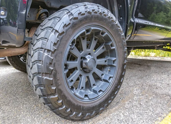 Large off roading tires and wheel on truck — Stock Photo, Image