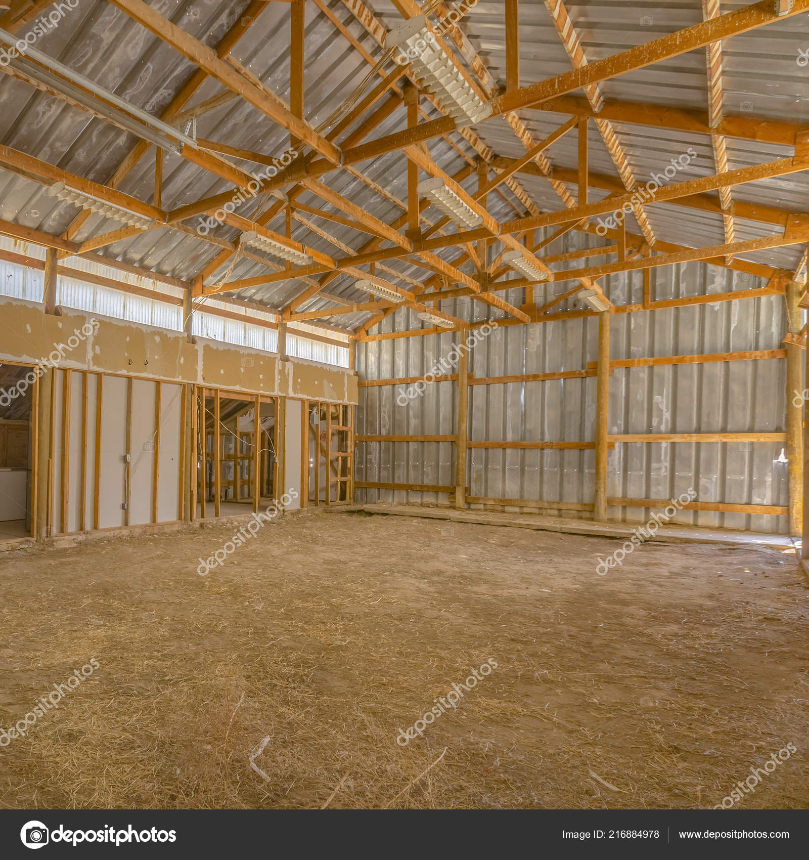 View Of A Barn Interior With Metal Roof And Wall Stock