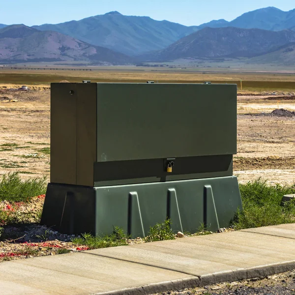 Power box on a construction zone near a mountain