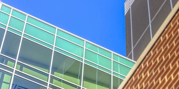 Glass and brick building in sunny Salt Lake City