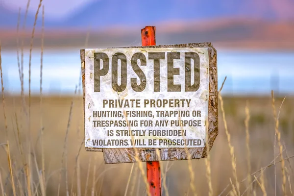 Old Posted sign on private property near Utah Lake — Stock Photo, Image