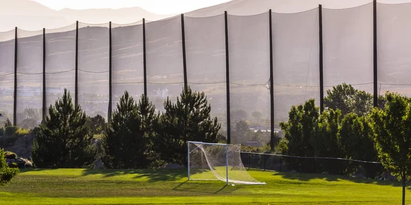 Soccer net on a golf course in sunny Utah valley