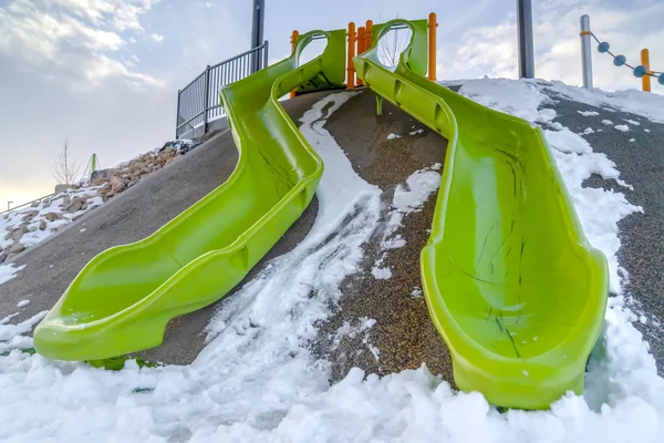 Double slides on a snow covered playground in Utah — Stock Photo, Image