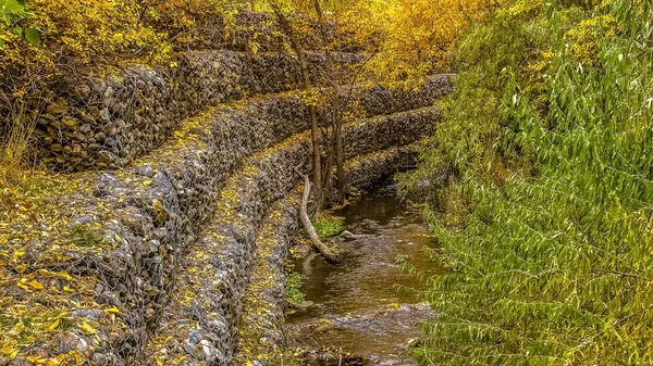 Screened in rocks on stream bank in Salt Lake City