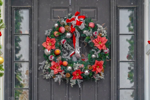 Glass paned front door with Christmas wreath