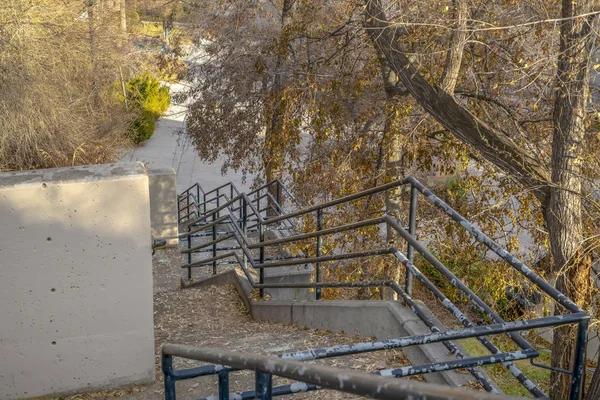 Outdoor staircase with weathered handrail in Utah