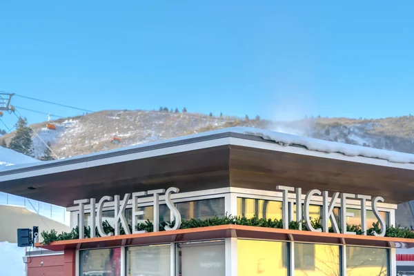 Ticket booth with snowy roof in Park City Utah