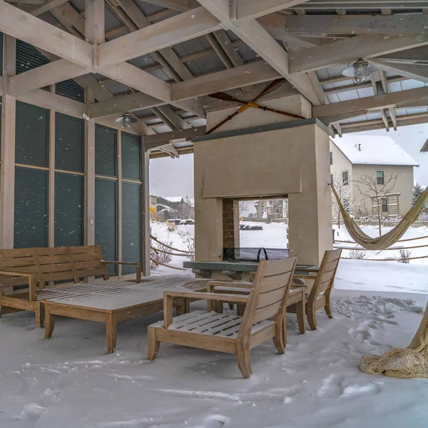 Square Snow covered patio of a clubhouse in Daybreak Utah