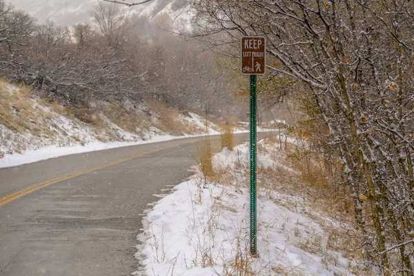 Winter road with traffic sign in Salt Lake City