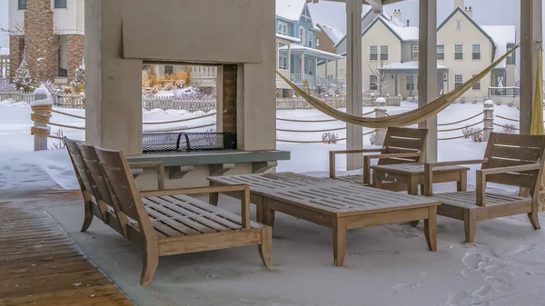 Panorama Clubhouse patio with view of a snowy landscape