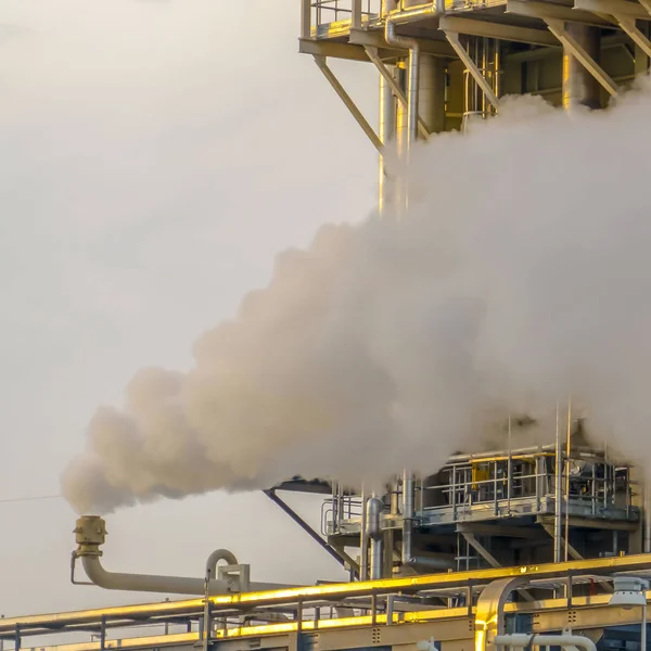 Clear Square Thick steam released through a pipe of a Power Plant in Utah Valley