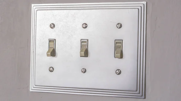 Panorama frame Close up of the electrical light switch against t — Stock Photo, Image