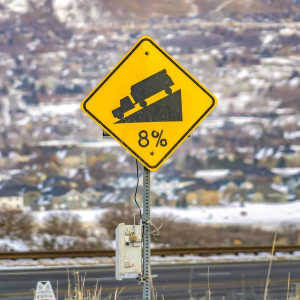 Square frame Close up of a yellow road grade sign with a truck o — Stock Photo, Image