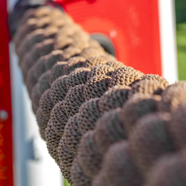 Square Close up of a brown rope illuminated by sunlight on a sun — Stock Photo, Image