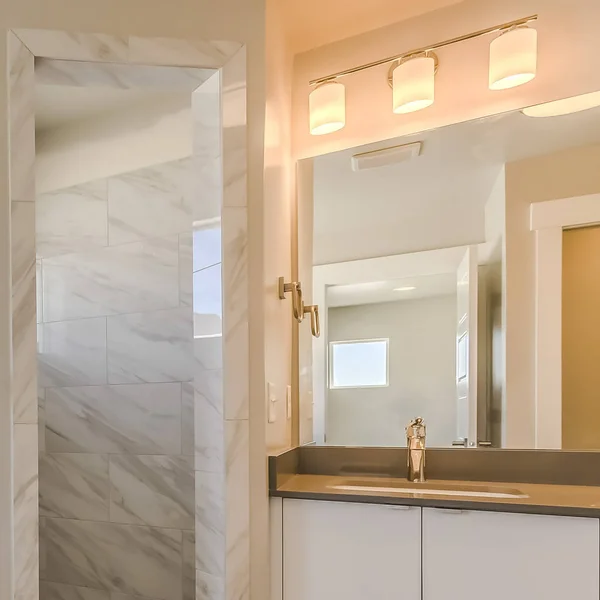 Frame Square Bathroom interior with bathtub glass door shower and vanity area — Stock Photo, Image