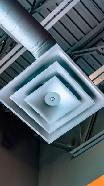 Panorama frame Close up view of a square air conditioner ventilator connected to a pipe — Stock Photo, Image