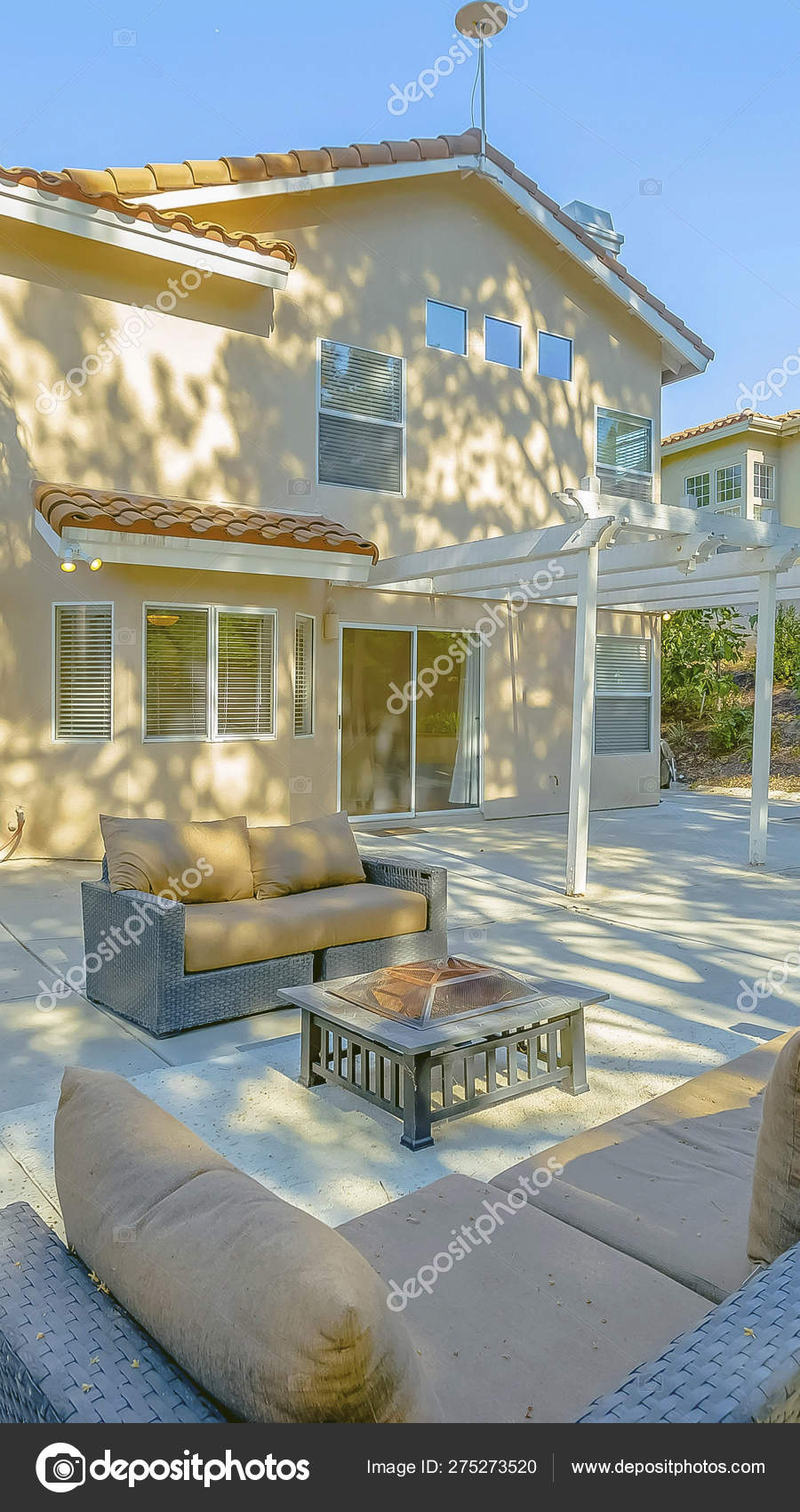Vertical Frame Outdoor Seating Area On The Patio Of A House