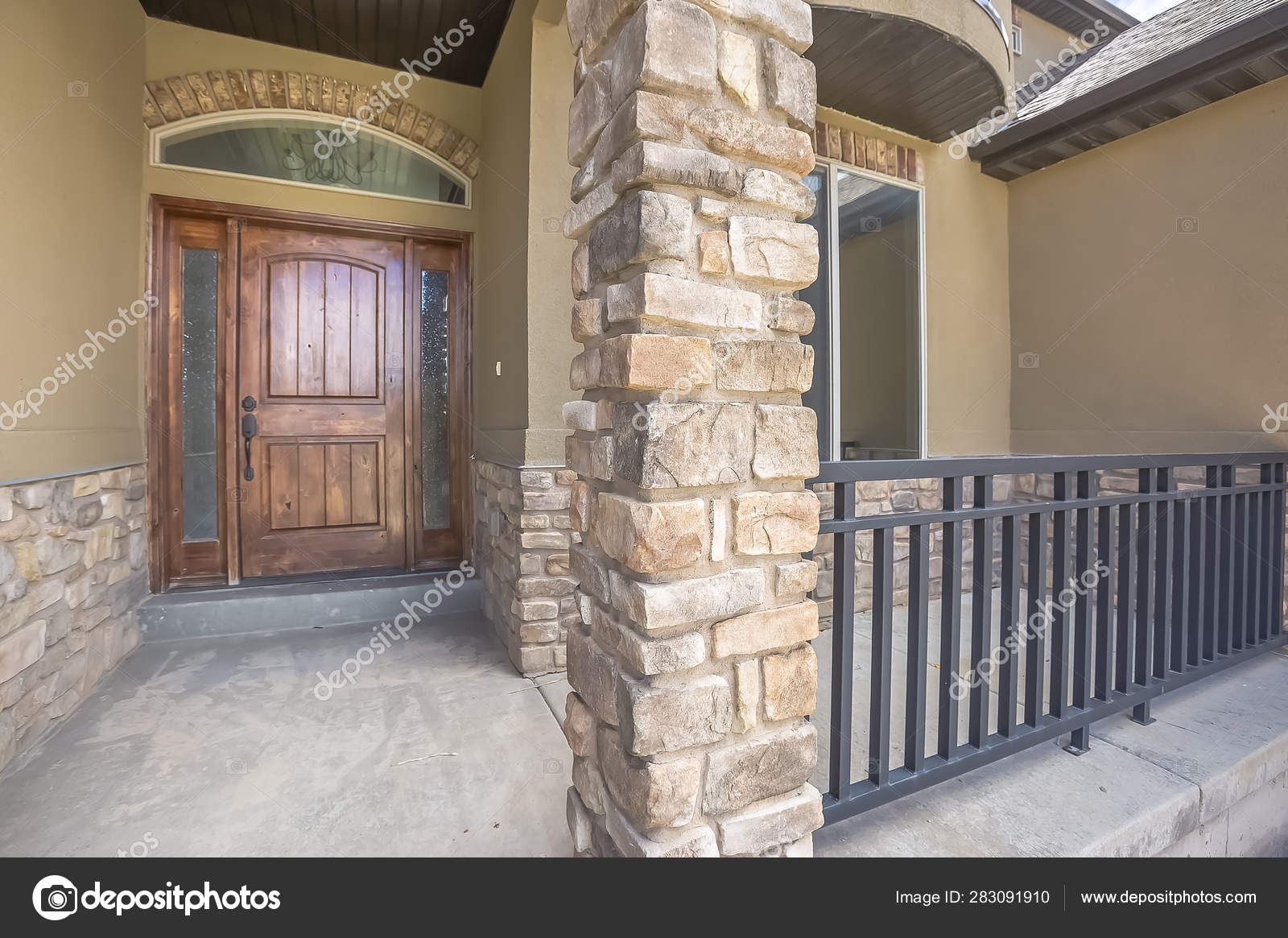 Home Facade With Brown Wood Door Frosted Sidelights And