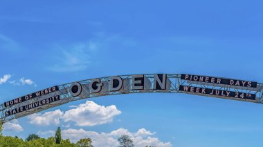 Panorama Back view of the towering welcome arch at the city of Ogden in Utah clipart