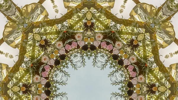 Panorama Circular floral design at wedding in California with roses and other flowers