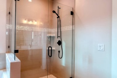 Bathroom rectangle shower stall with half glass enclosure and hinged door clipart