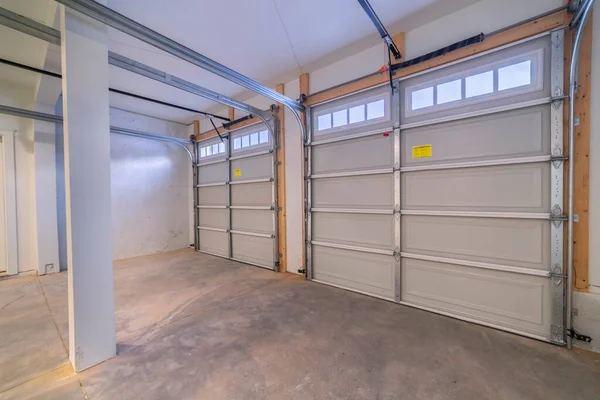 Inside an empty closed garage interior door