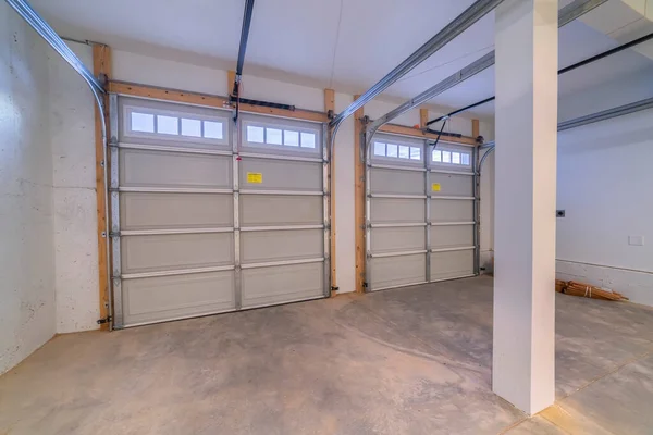 Inside an empty double vehicle garage interior