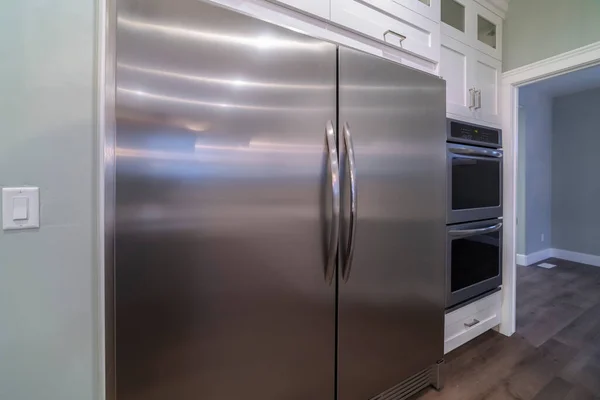 Large double door American fridge in a kitchen