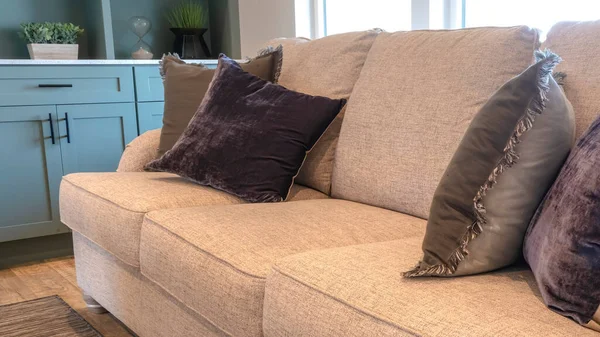 Panorama crop Living room interior with close up of cozy sofa against window and cabinet