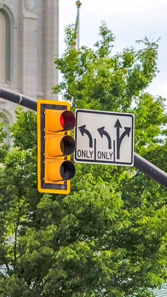 Vertical Traffic lights and road signs mounted on metal pole in Salt Lake City Utah — Stock Photo, Image