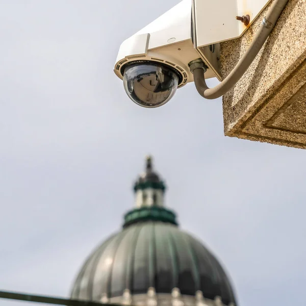 Square frame Outdoor dome security cctv camera with Utah State Capital Building background — Stock Photo, Image