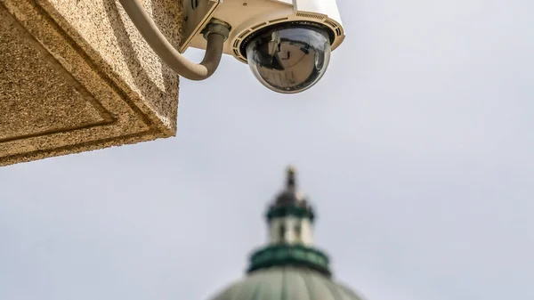 Panorama frame Outdoor dome security cctv camera with Utah State Capital Building background — Stock Photo, Image
