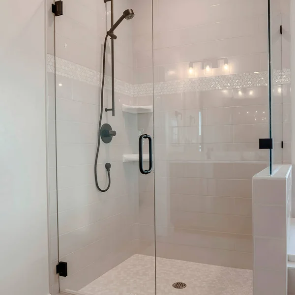Square Bathroom shower stall with half glass enclosure adjacent to built in bathtub — Stock Photo, Image