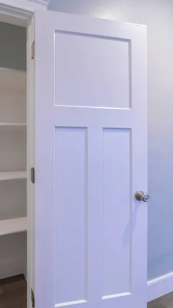Vertical Open empty fitted cupboard or wardrobe interior — Stock Photo, Image