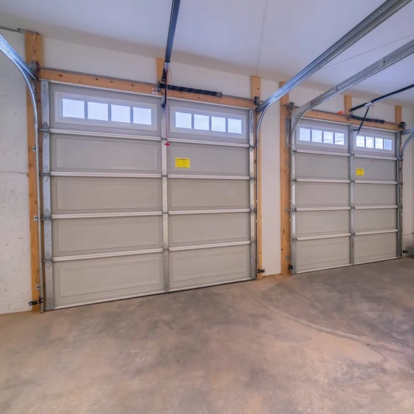 Square Inside an empty double vehicle garage interior