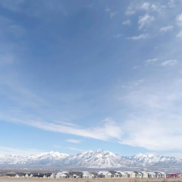 Square Panoramic view of South Jordan City neighborhood and Wasatch Mountains in winter — стокове фото