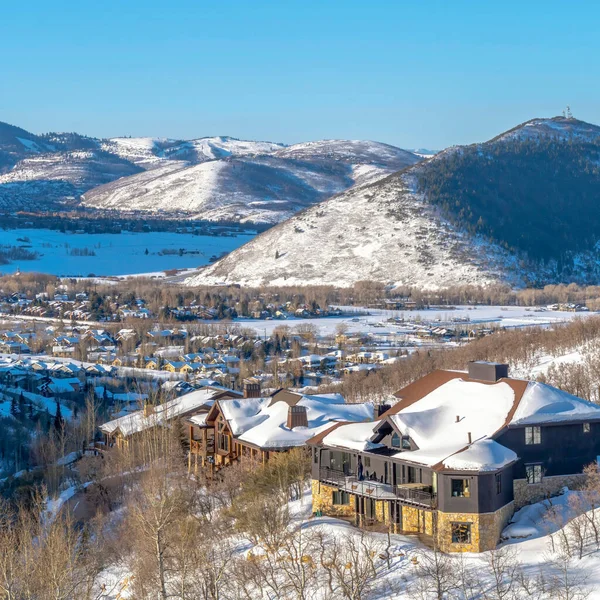 Square Picturesque Park City Utah winter landscape with snowy homes and frosted hills