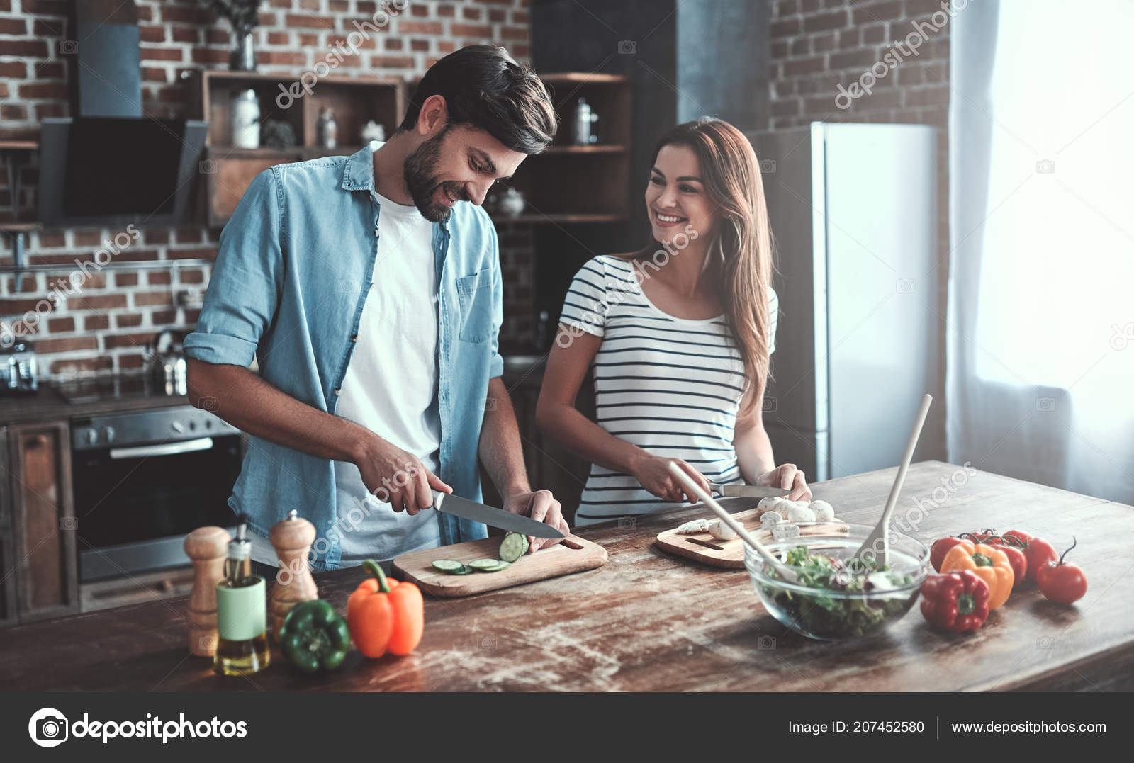 Romantic Couple Cooking Kitchen Handsome Man Attractive Young Woman Having Stock Photo by